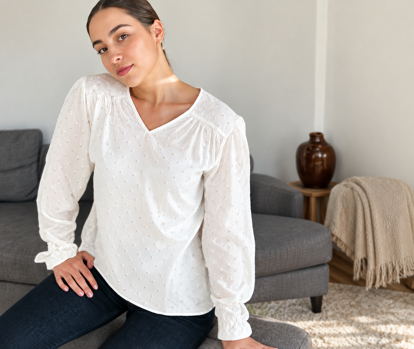Une blouse blanche cousue main